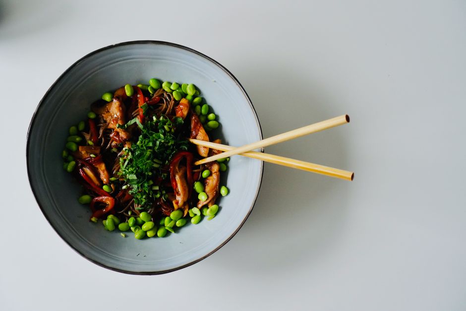 Delicious noodle dish with edamame and herbs, perfect for healthy meals.