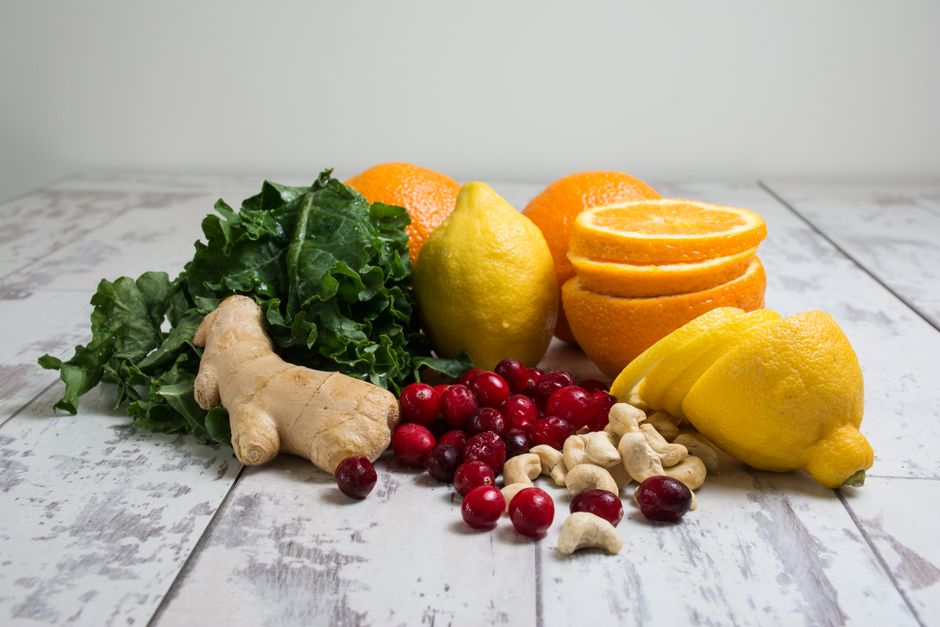 A vibrant mix of lemons, oranges, ginger, and greens with cranberries and cashews.