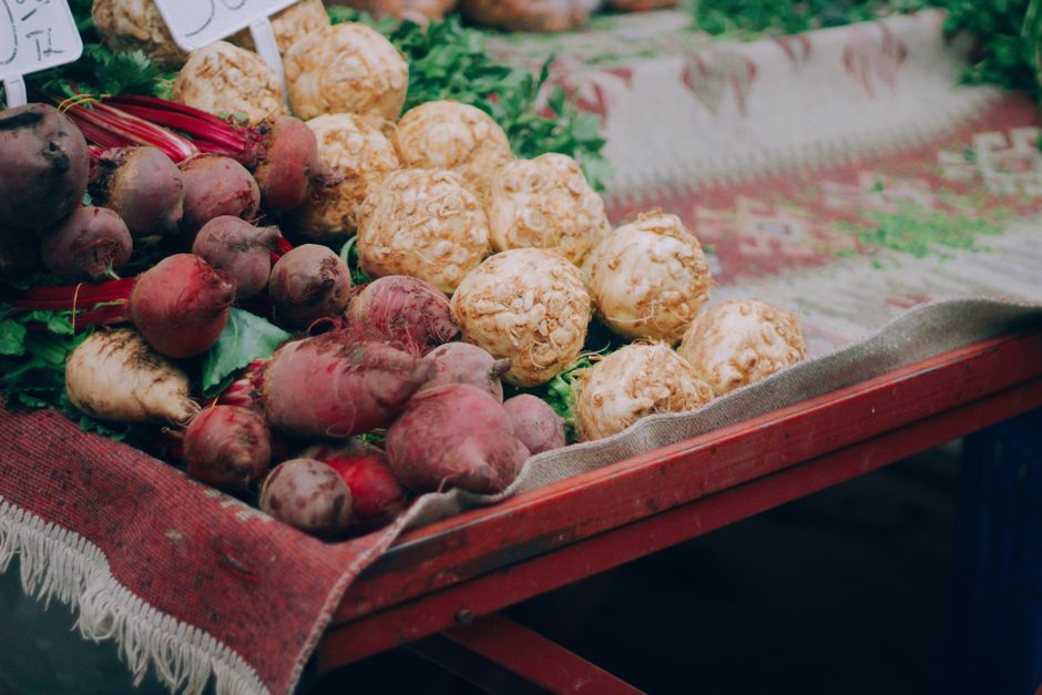 Vibrant display of fresh beets and celery root at a local market in Muğla, Türkiye.